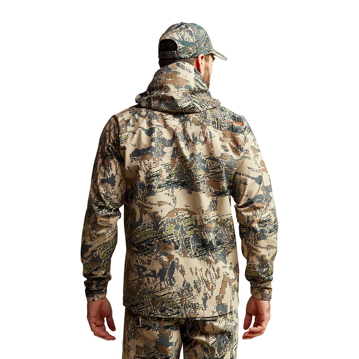 SITKA Dew Point hood deployed in changing weather for instant coverage.