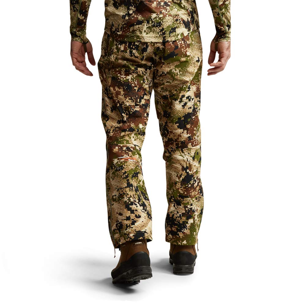 SITKA Dew Point pant side zip shows easy on/off and venting in bad weather.