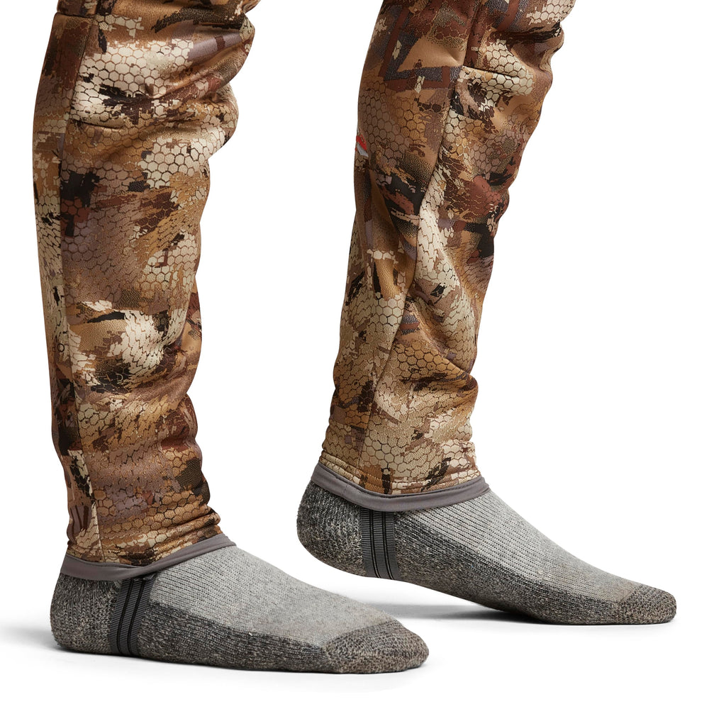 SITKA Gradient Pant layering under waders demonstrates warmth without bulk.