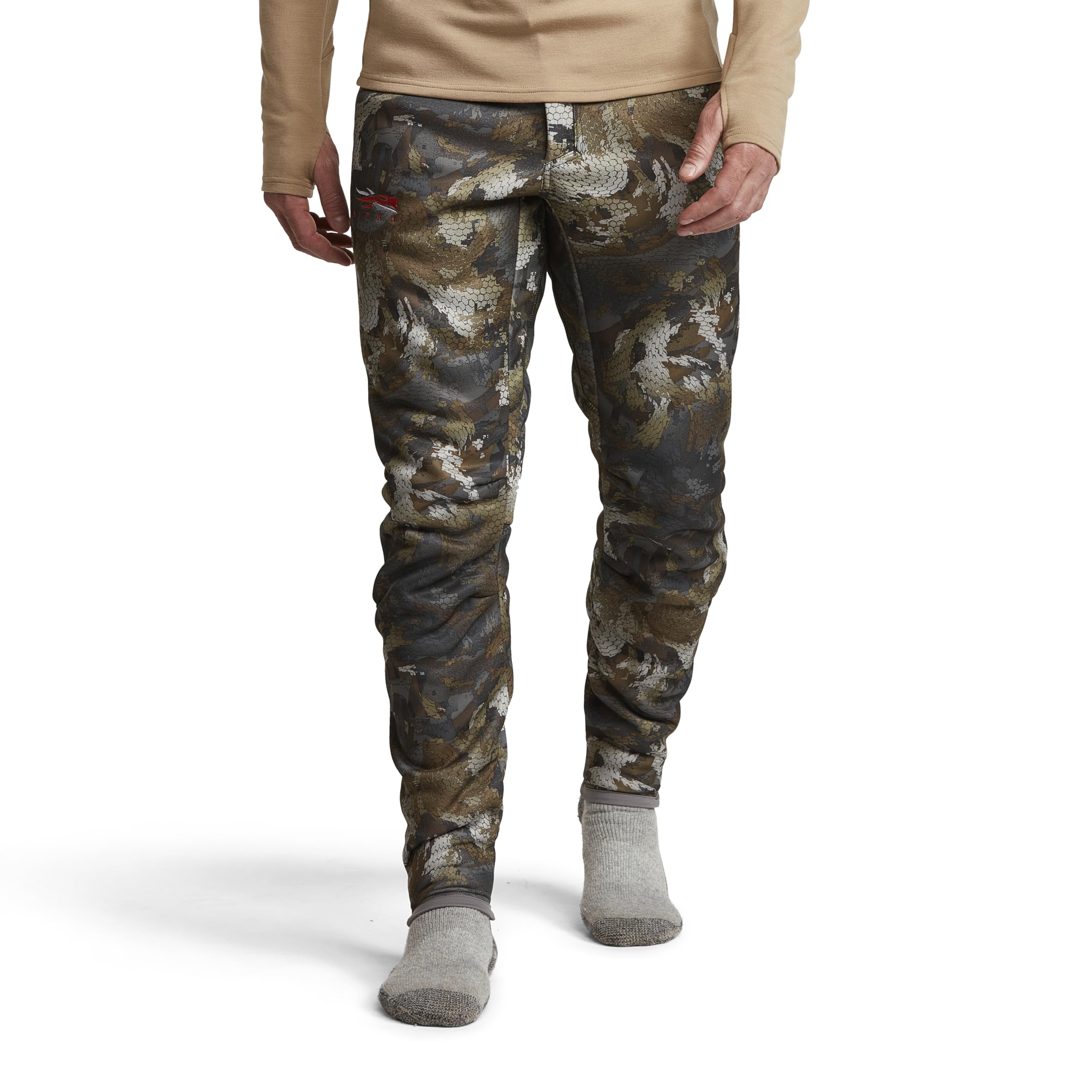 SITKA Gradient Pant waist and mobility detail with layered wading gear