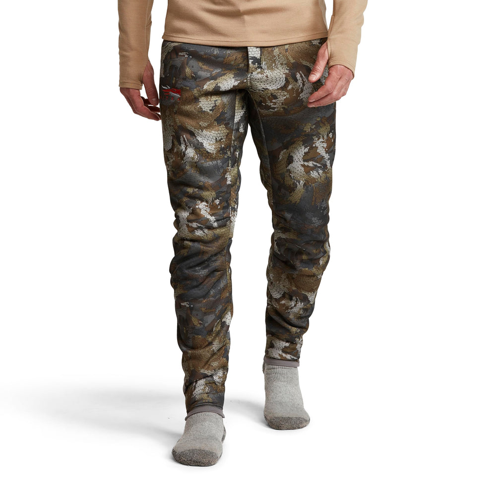 SITKA Gradient Pant waist and mobility detail with layered wading gear