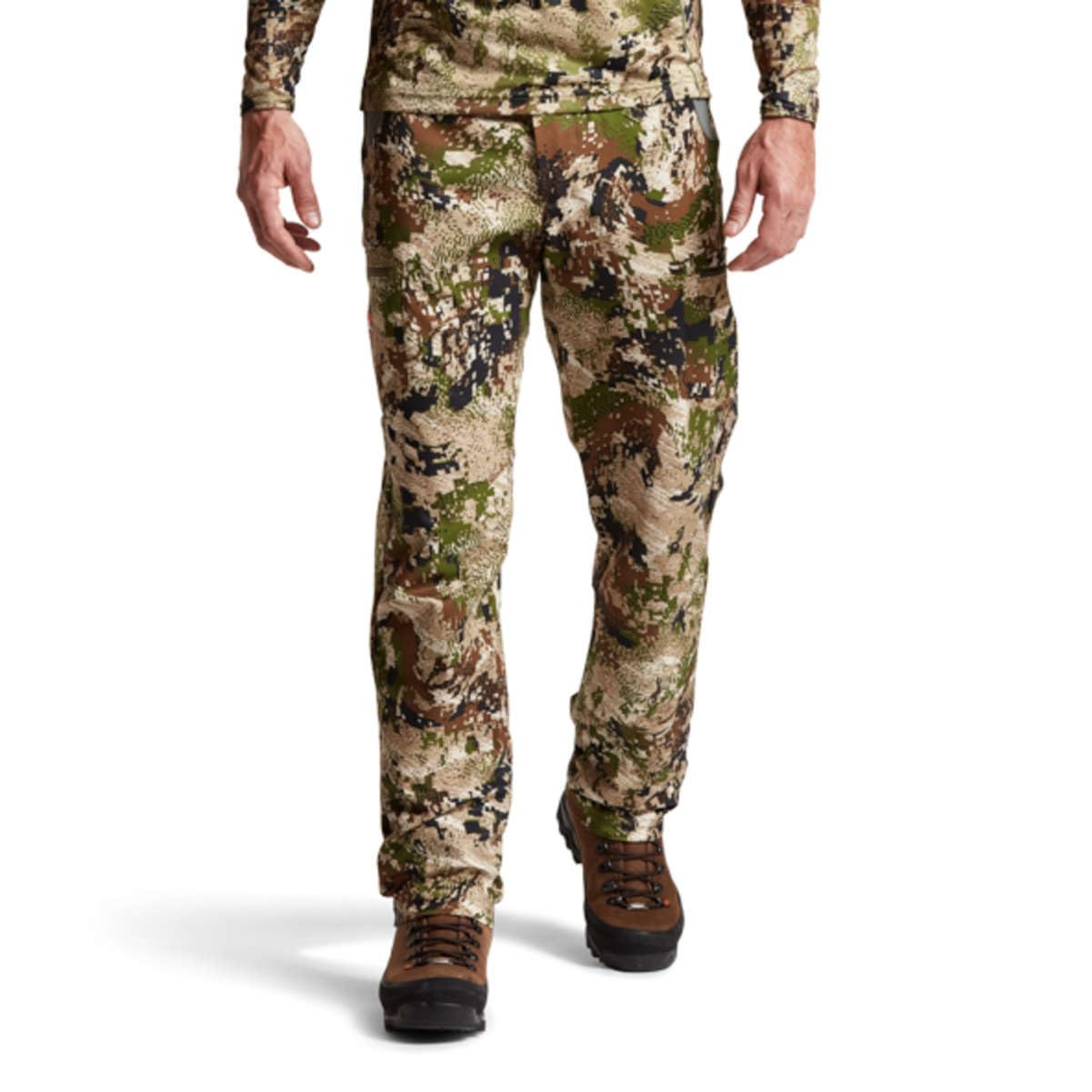SITKA Traverse pants water-repellent finish sheds light rain for wet vegetation.