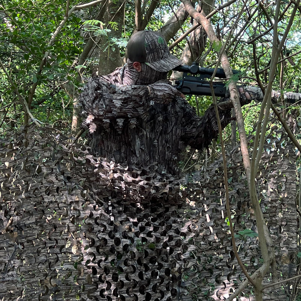 Sitong green camo netting blends with foliage for outdoor décor and hides.