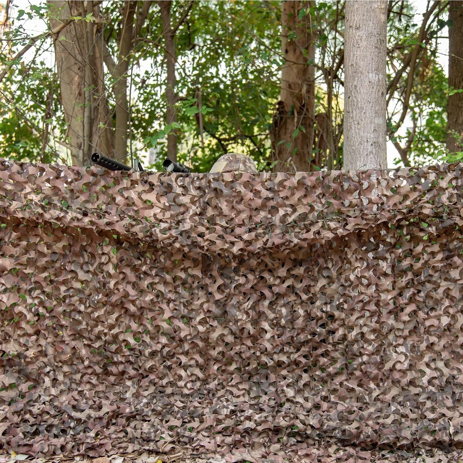 Sitong bulk roll camo netting in woodland pattern ideal for hunting setups.