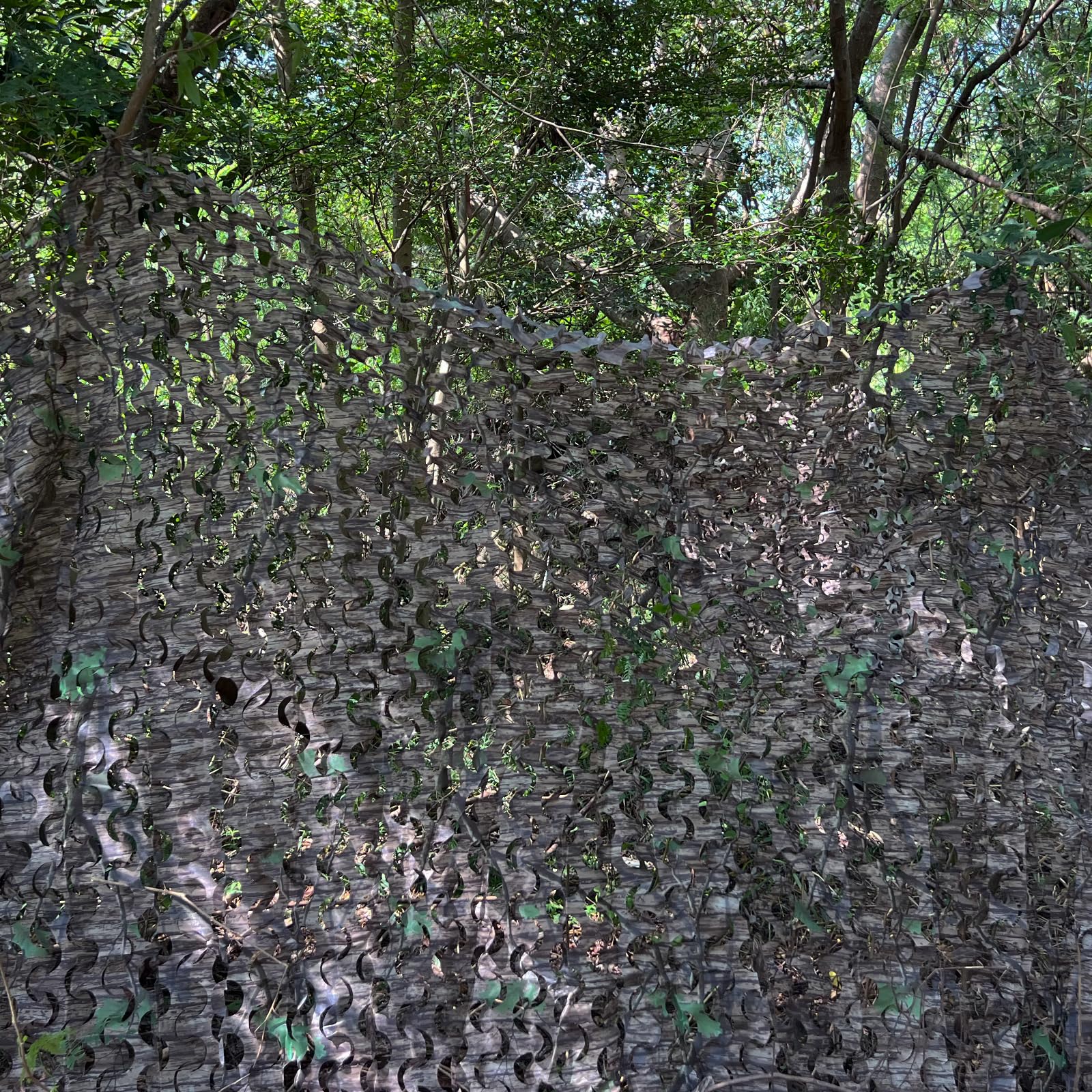 Sitong snow-pattern camo netting blending into snowy environments for winter camouflage.