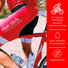 Applying SKIN SLICK to the thigh area to prevent chafing during activity.