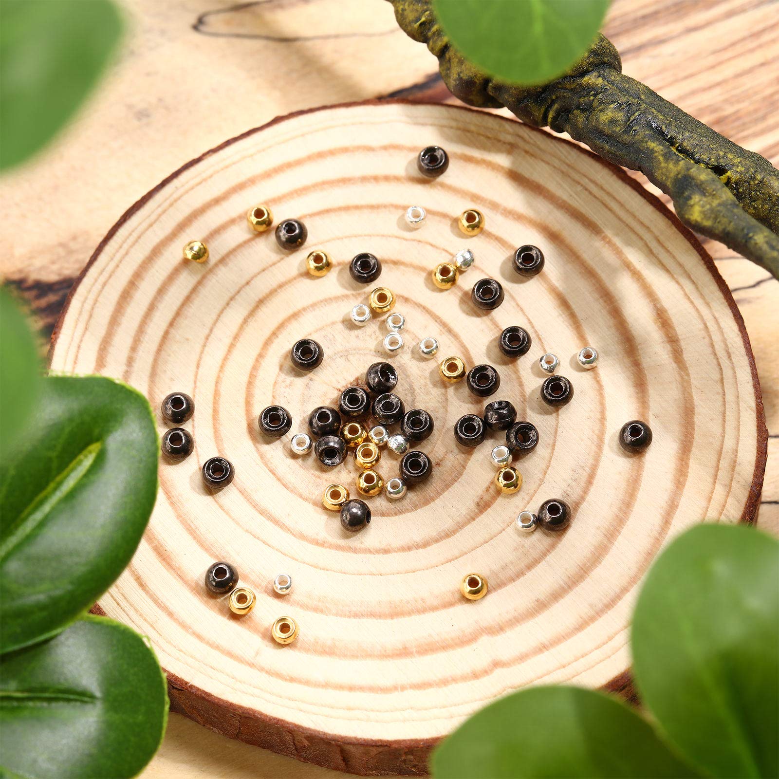 Beads being added to a hook for weight and sinking