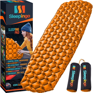 Sleepingo inflatable mat folded for compact backpacking carry.