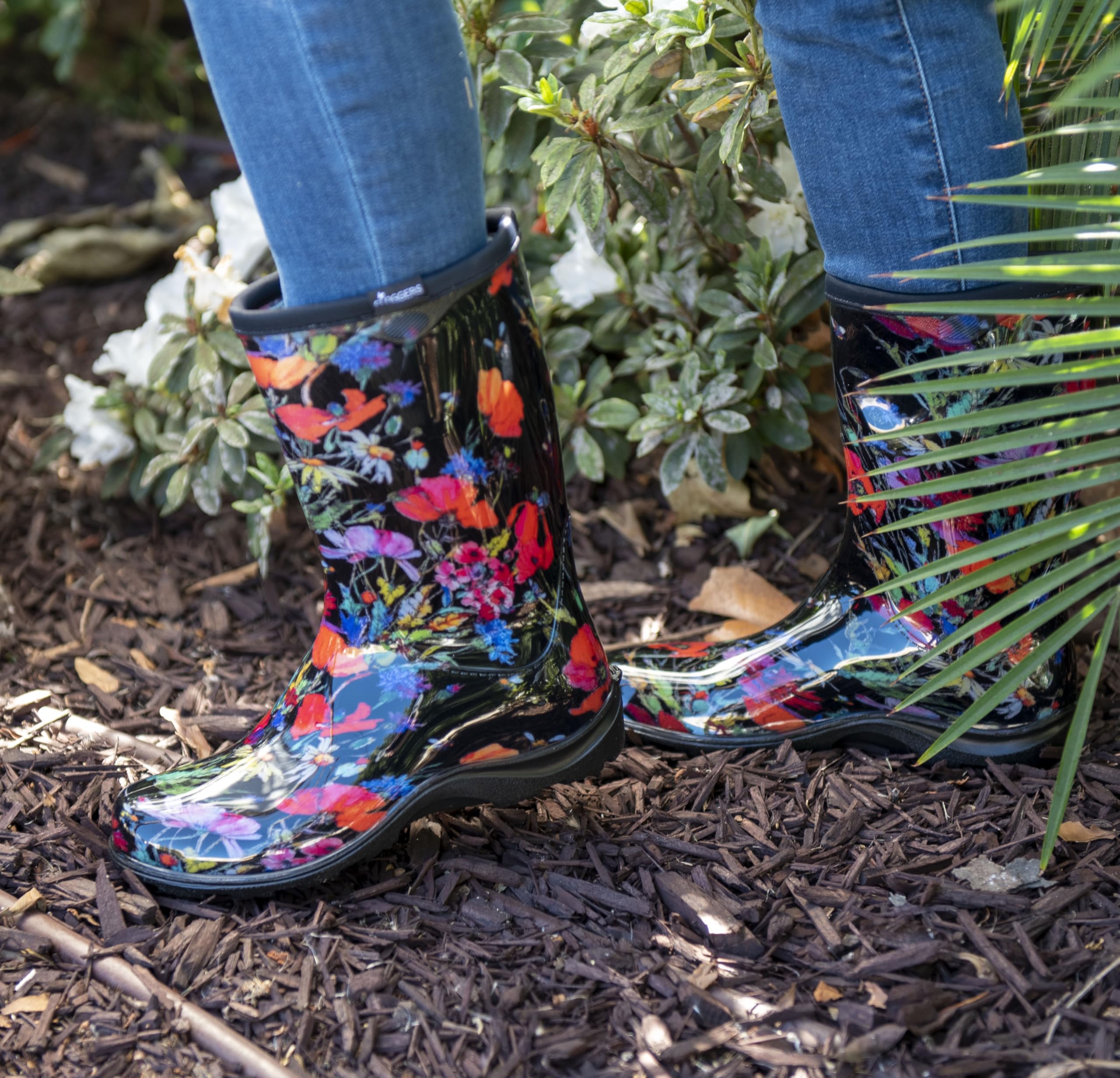 Sloggers midcalf-rain-boot-traction demonstrates strong grip on muddy paths.