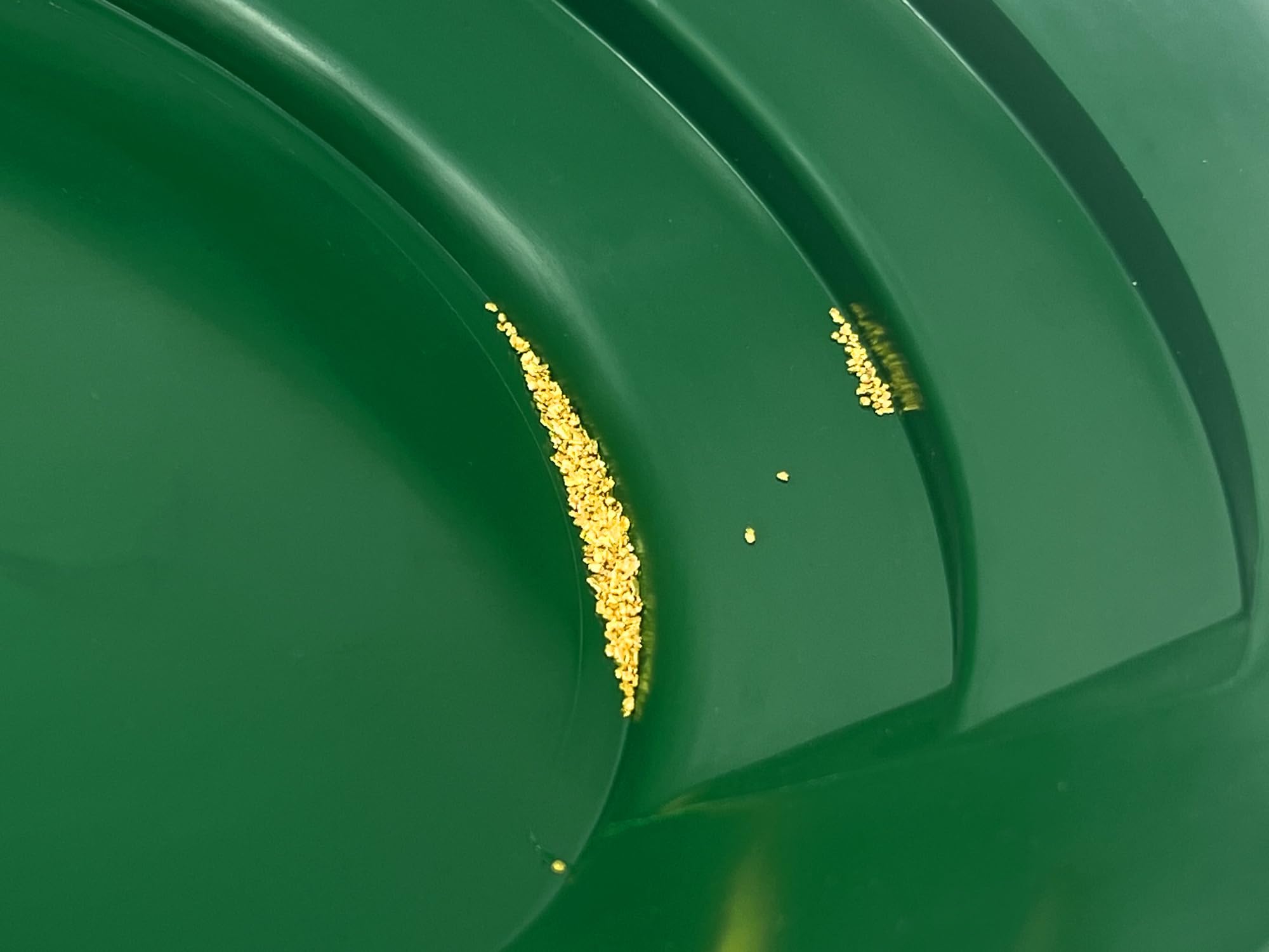 Sluice Fox prospector scoop for scooping sediment from streams.