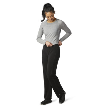 Smartwool women's straight leg pant in black, back view showing sleek fit.