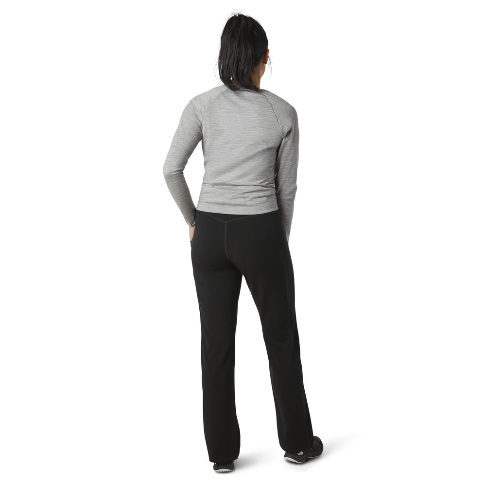 Smartwool women's straight leg pant in black, side view reveals clean lines for work.