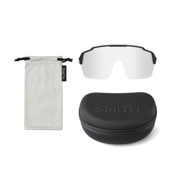 Includes hard case and extra clear lens for versatile travel.