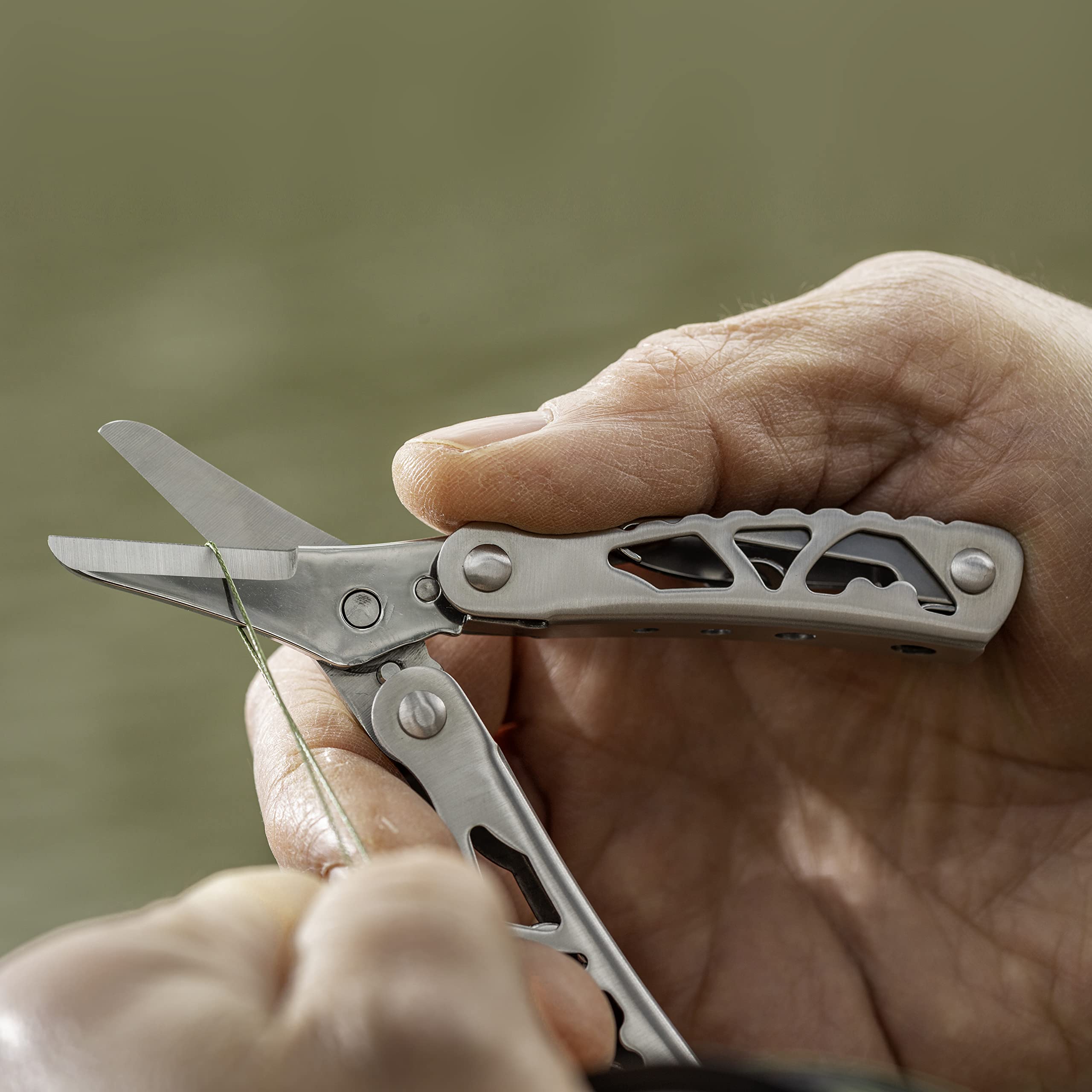 Smith's Caprella integrated carabiner keeps tool within reach while fishing