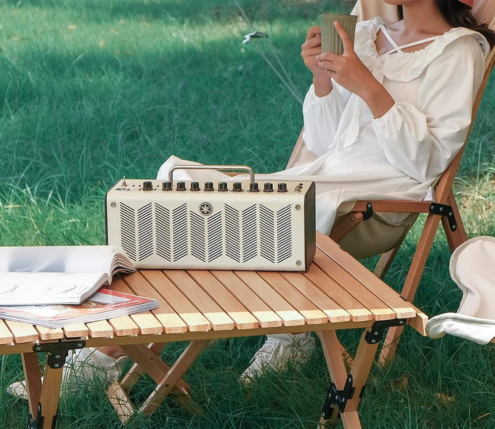 S'more folding picnic table in storage bag for effortless car travel.