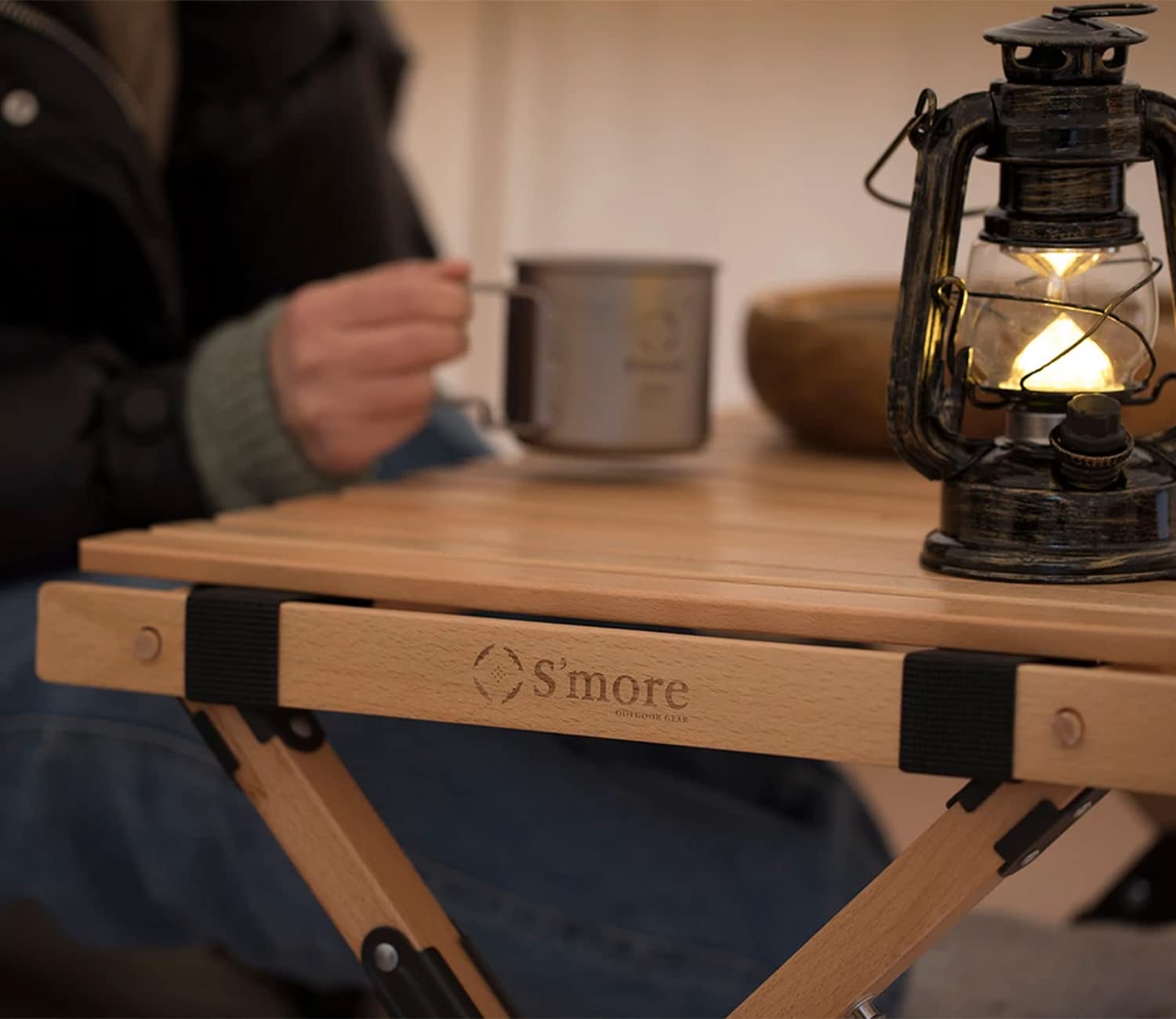 S'more folding picnic table with stable X-frame for outdoor safety.