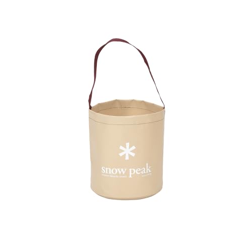 Snow Peak camping bucket used to wash dishes at a campsite.