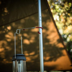Snow Peak Lantern Hanger Large in use at campsite provides ambient lighting.