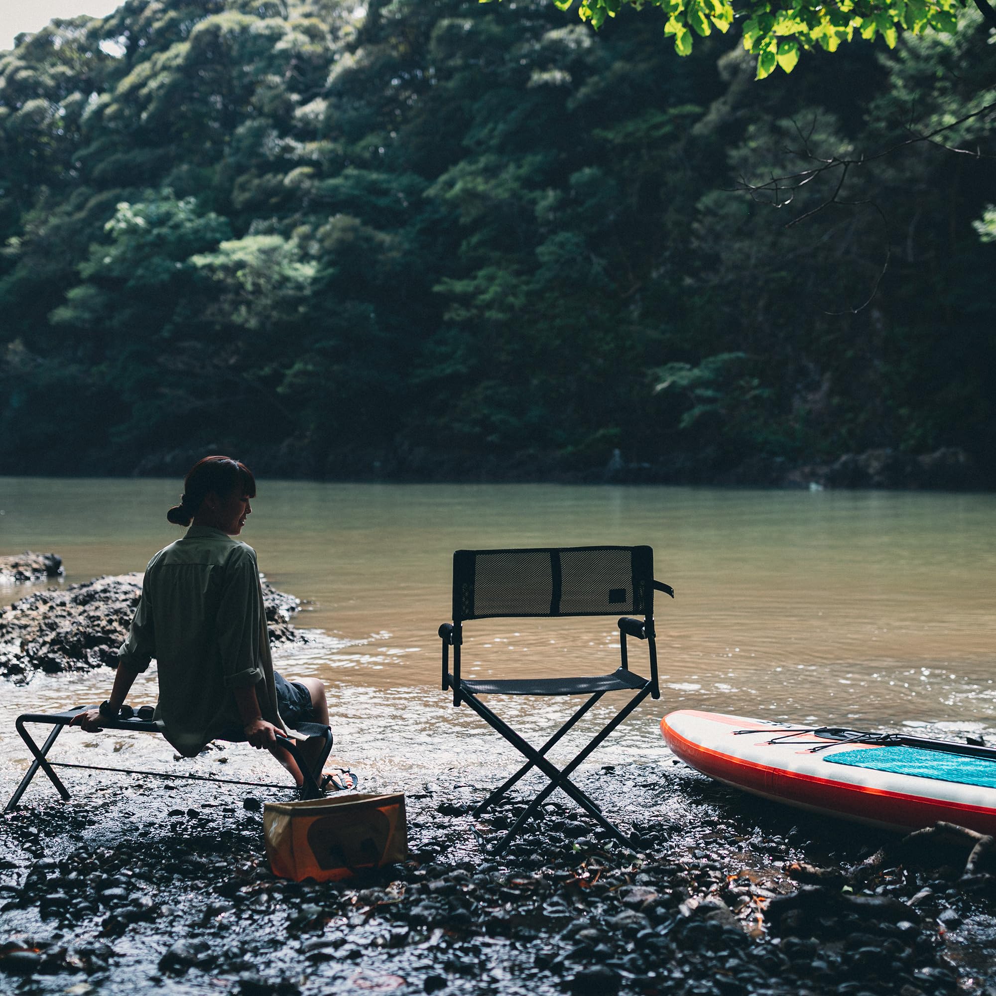 Snow Peak Mesh Folding Chair folded-compact demonstrates easy transport and space-saving travel.