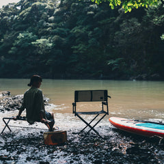 Snow Peak Mesh Folding Chair folded-compact demonstrates easy transport and space-saving travel.