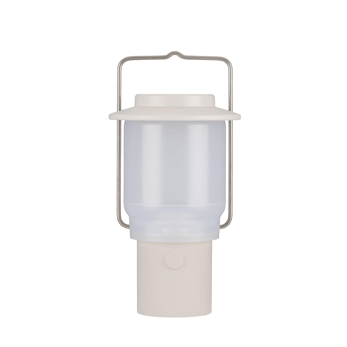 Snow Peak Mini Hozuki battery-powered lantern emitting warm ambient light at a campsite