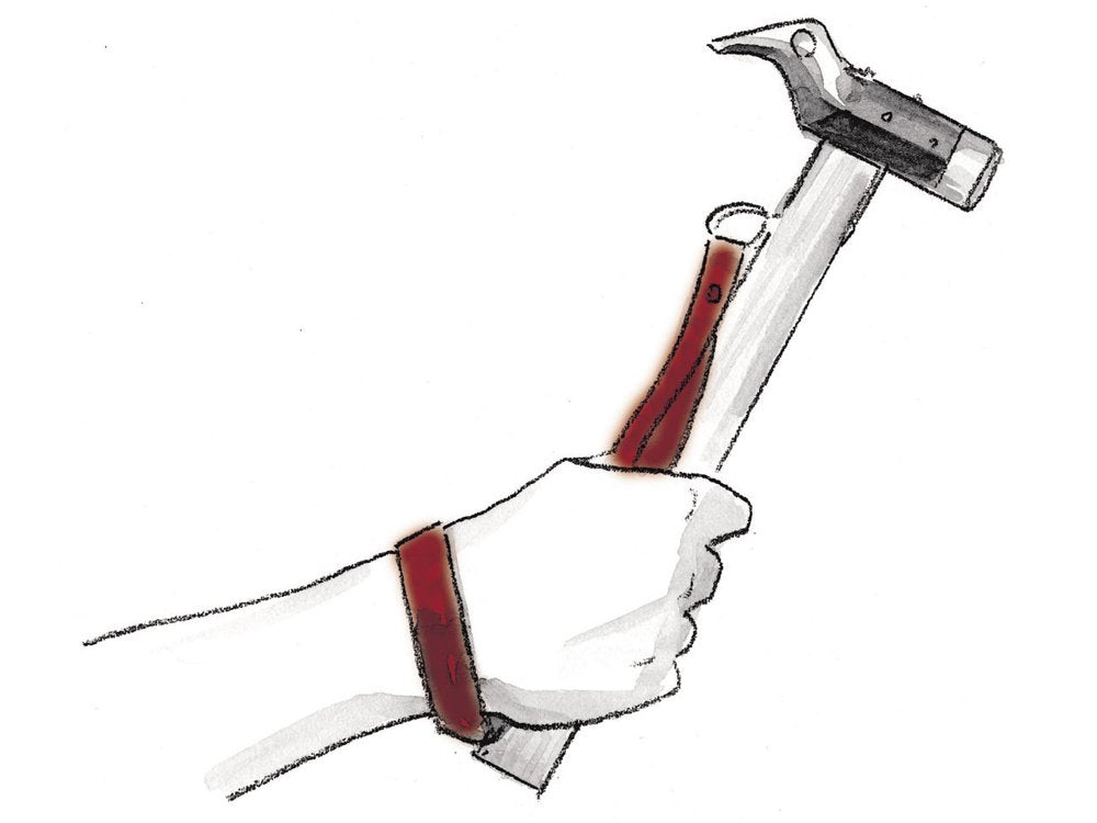 Snow Peak peg hammer used for campsite breakdown and peg removal.