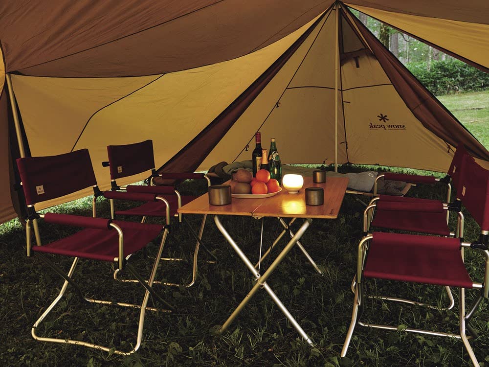 Snow Peak compact design with dimensions 36 by 28 by 26 inches for small groups.