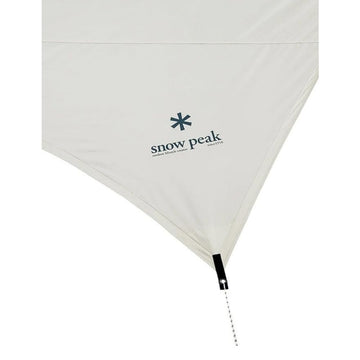 Snow Peak Takibi Tarp Hexa Set roof with fire underneath enables cozy warmth.