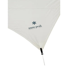 Snow Peak Takibi Tarp Hexa Set roof with fire underneath enables cozy warmth.