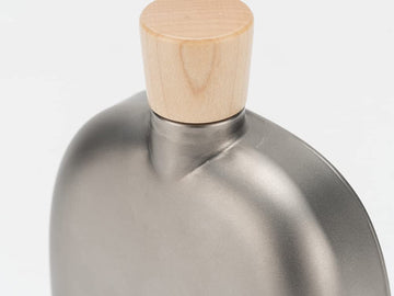 Snow Peak titanium flask top view displaying sleek profile