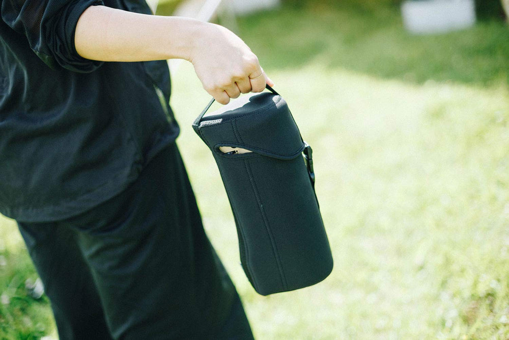 Snow Peak UG-551 black burner case closeup conveys durable neoprene construction.