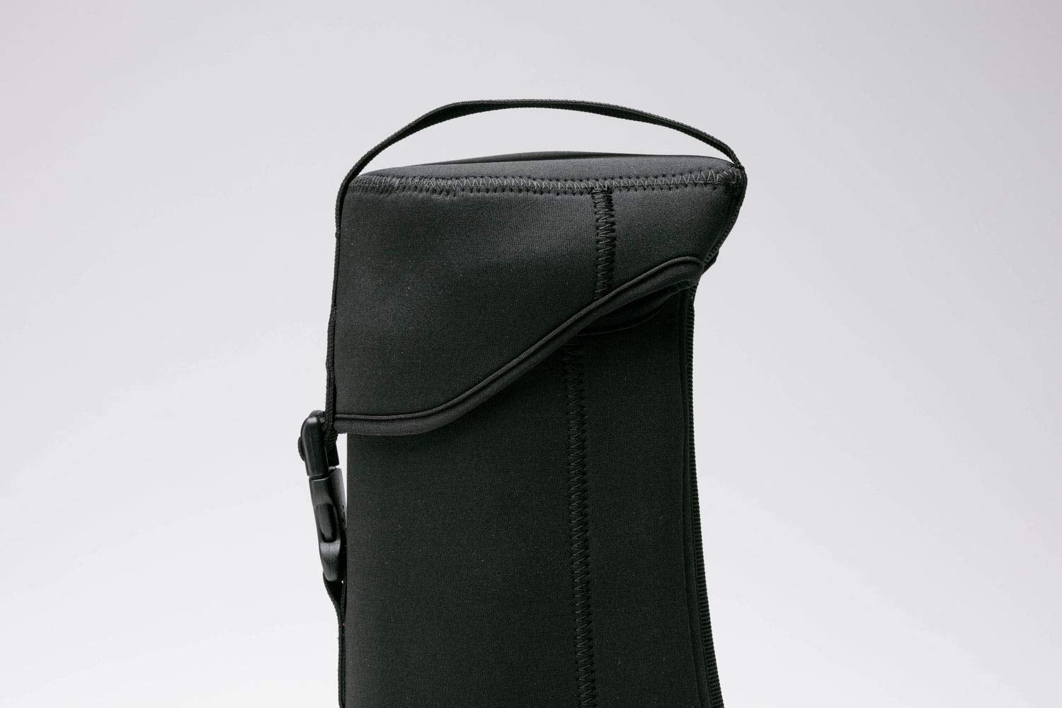 Snow Peak UG-551 neoprene material closeup emphasizing soft cushioning protects burner during travel.
