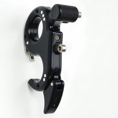 sntxmy compound bow thumb button close-up demonstrates precise trigger control for consistent releases