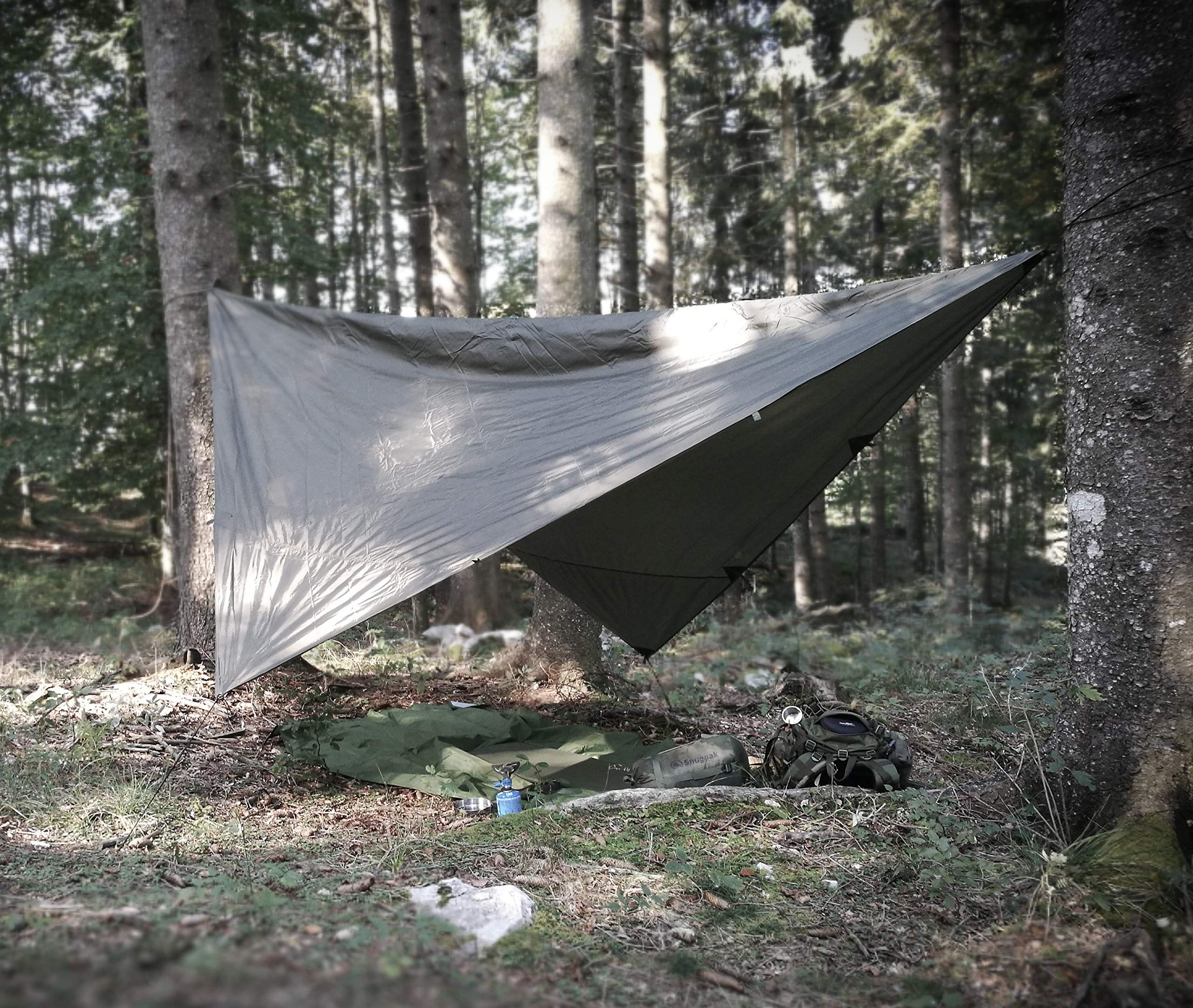 Snugpak All Weather Shelter G2 diamond tarp in action, keeping gear dry.