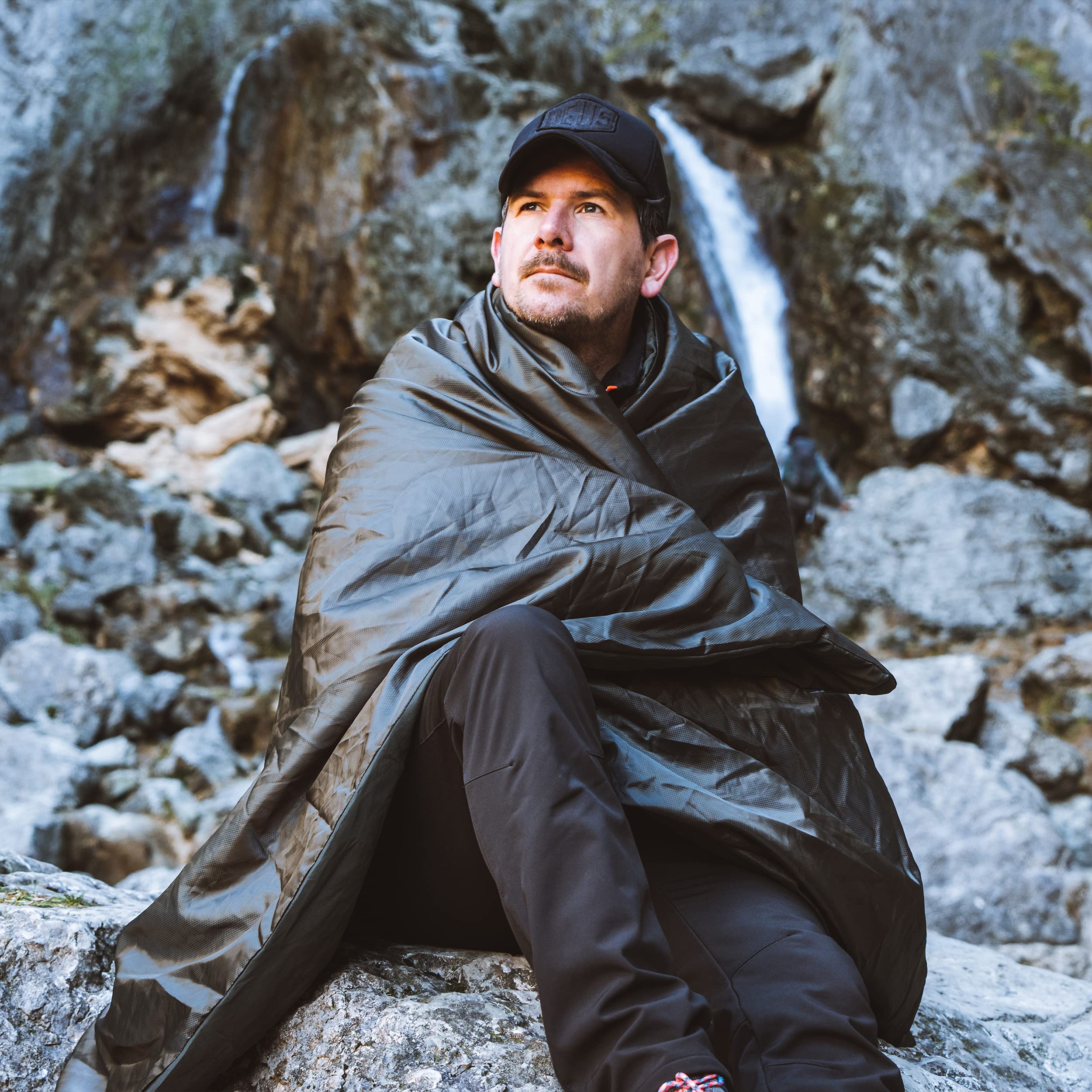 Snugpak Jungle Blanket laid flat shows full 76 by 64 inch coverage.