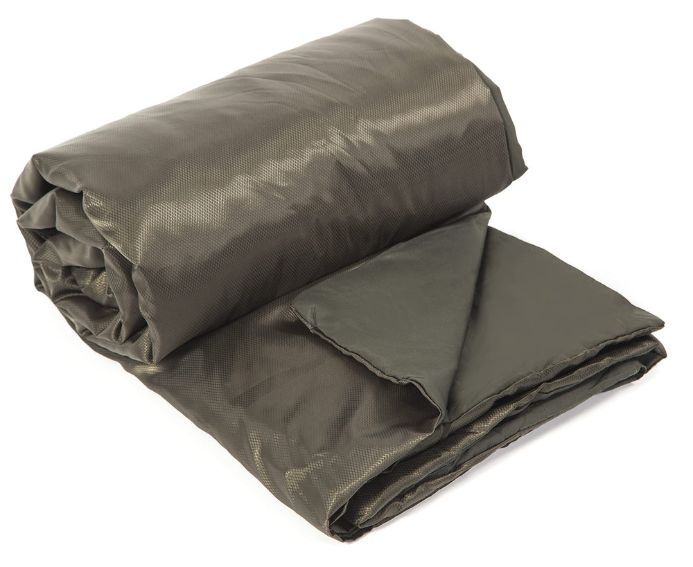 Snugpak Jungle Blanket fabric with water-repellent finish for damp outdoor conditions.