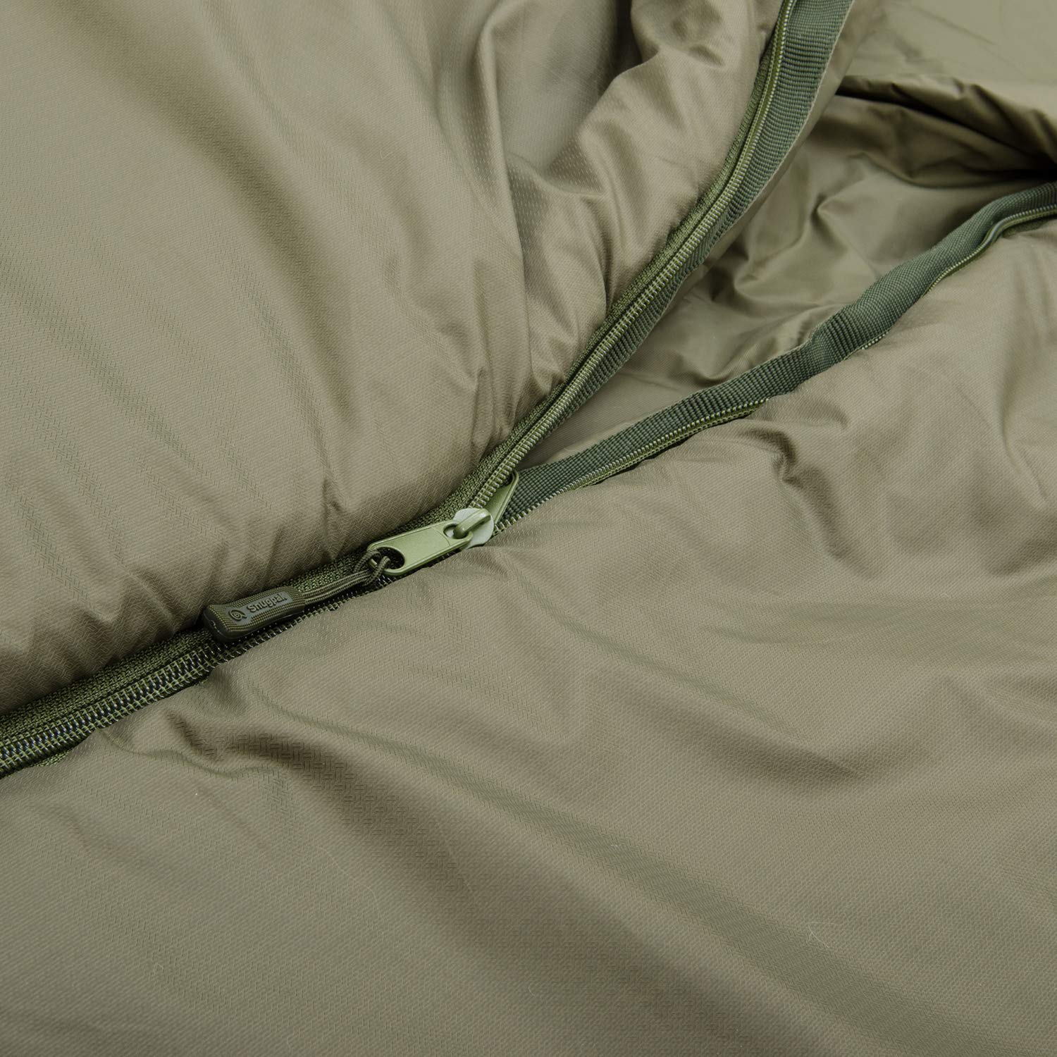Snugpak Special Forces Sleep System olive color blends with gear for outdoor readiness.