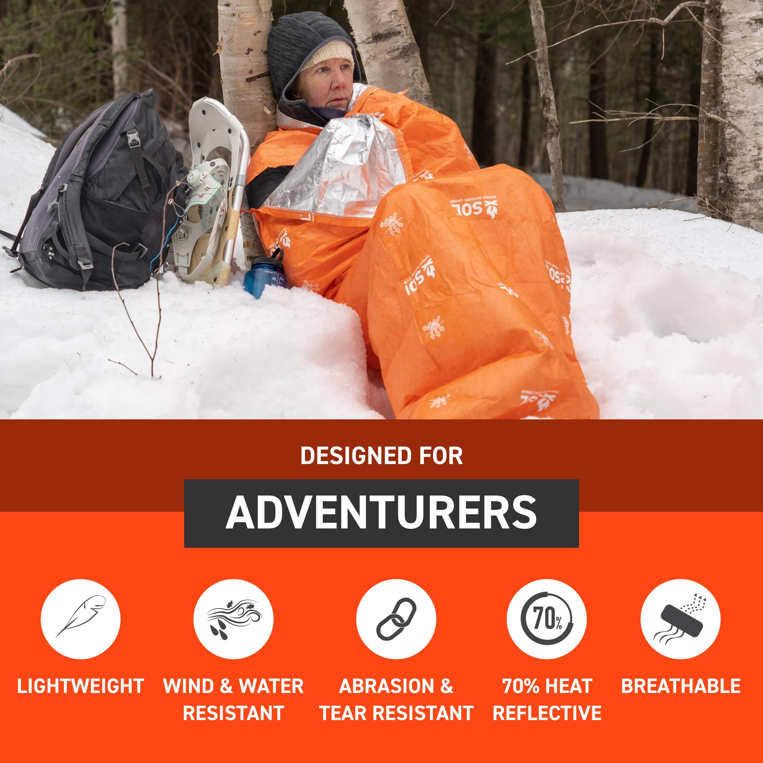 Close-up of the orange SOL bivvy ready for ultralight backpacking.