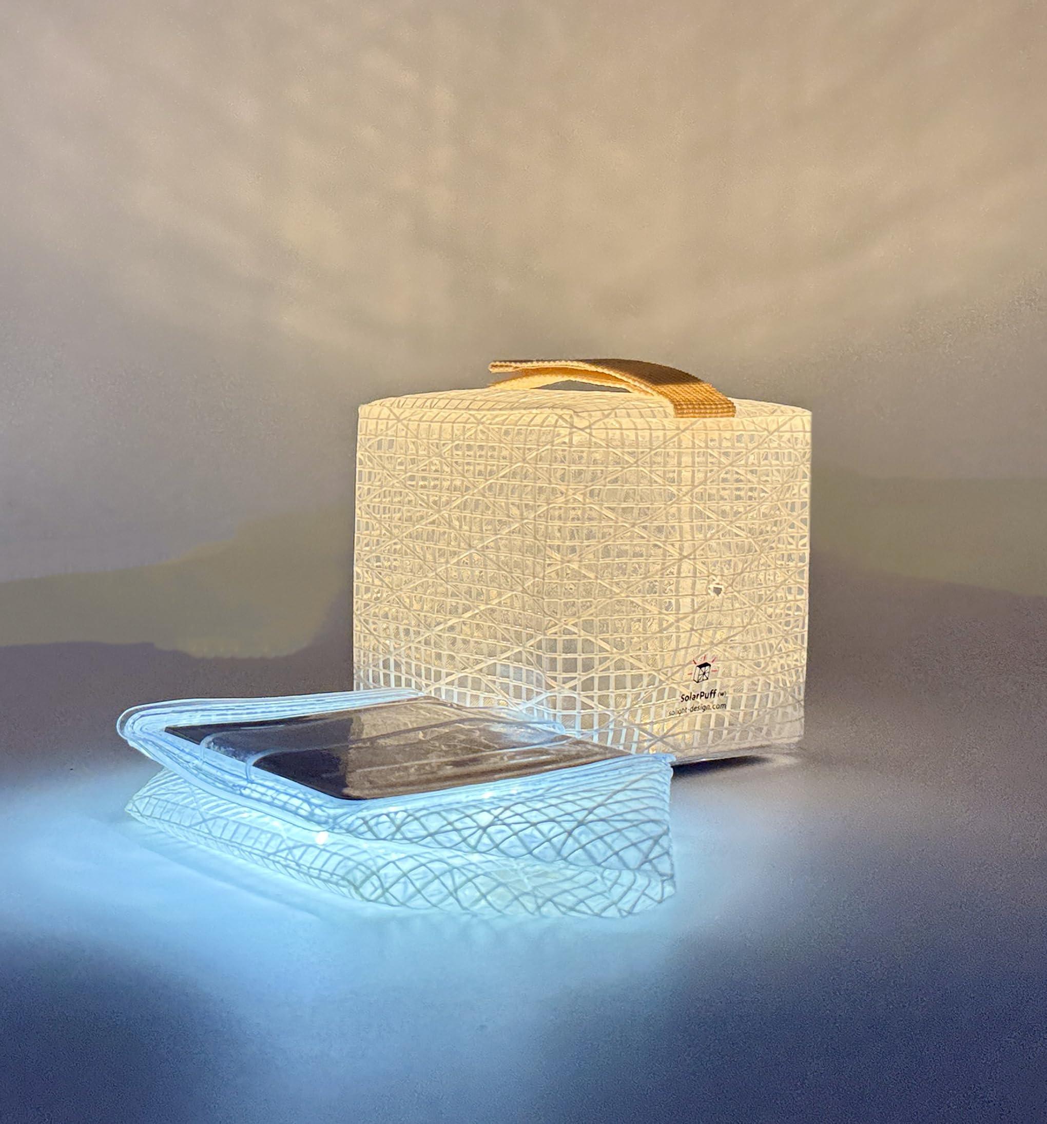 Solight Design SolarPuff collapsible lantern showing quick-open fold feature.