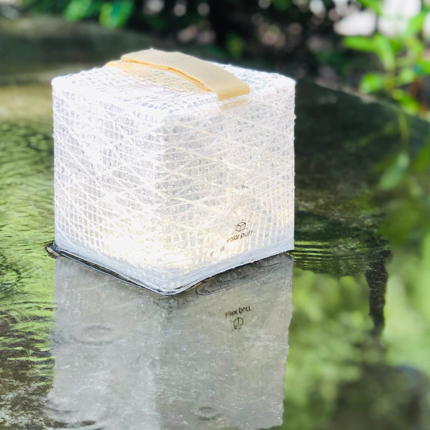 Solight Design SolarPuff lantern with light sensor for automatic dusk illumination.