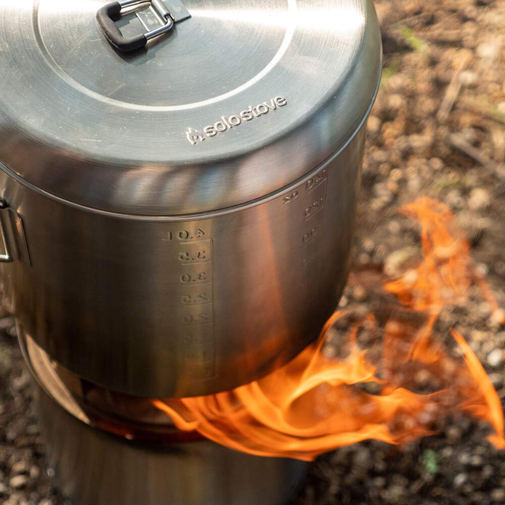 Solo Stove Pot 4000 in use shows portable cooking flexibility.