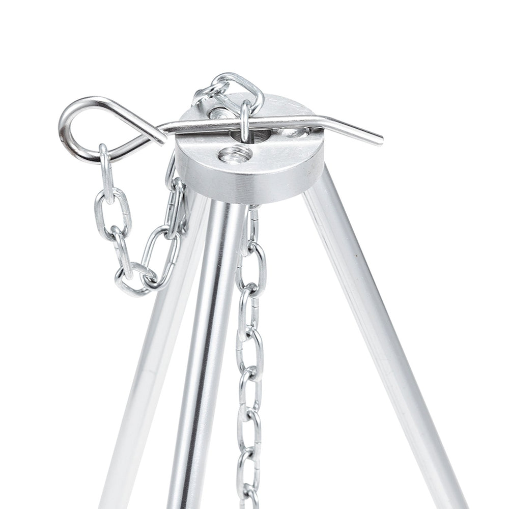 Solo Stove tripod setup with hanging chain enables adjustable pot height for even heating.