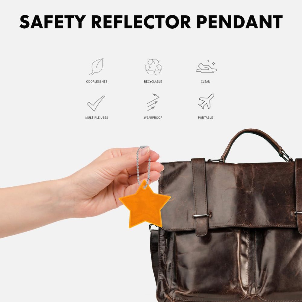 Sosoport reflective PVC star keychain worn on clothing increases low-light recognition.
