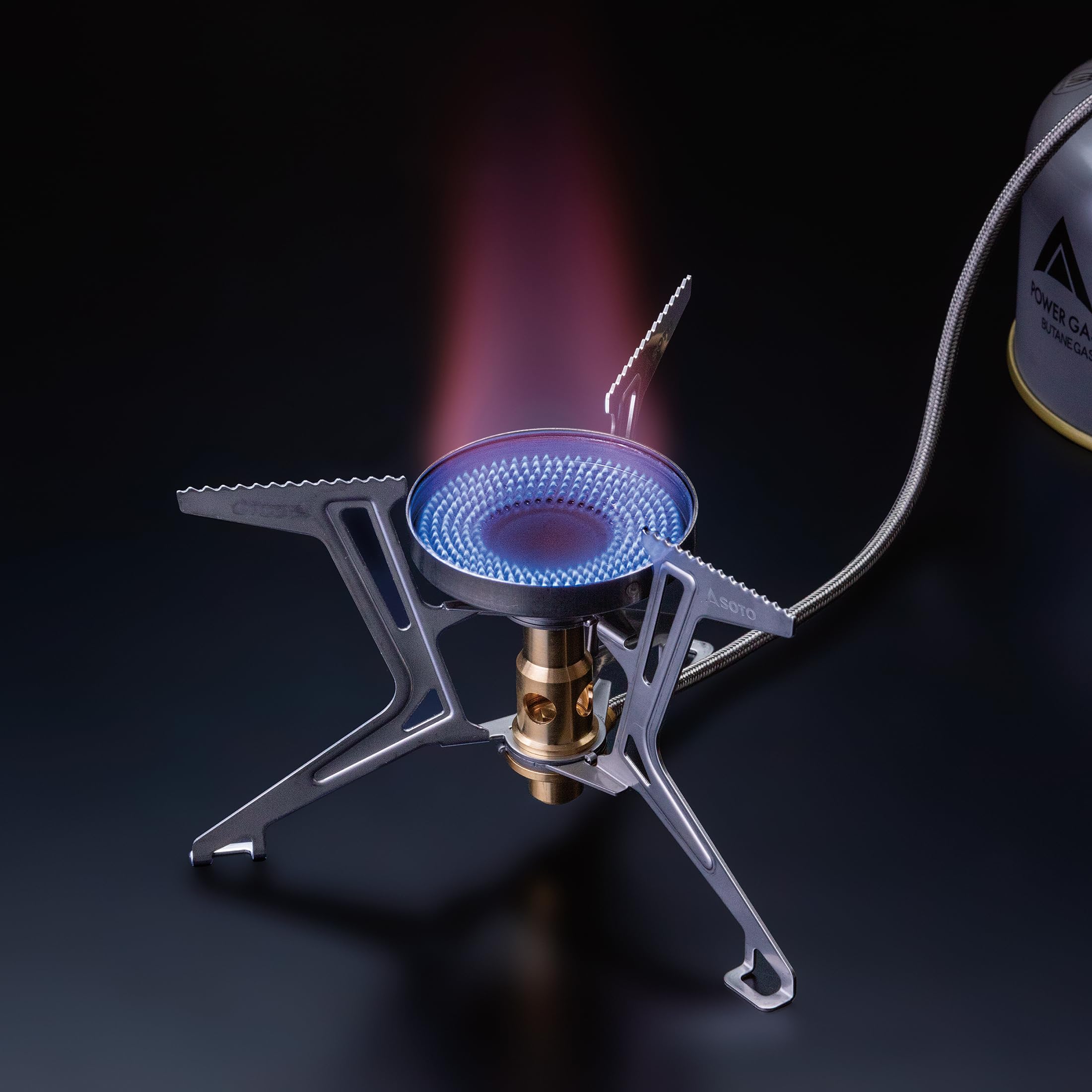 SOTO Fusion Trek micro regulator close-up highlights steady flame for varied conditions.