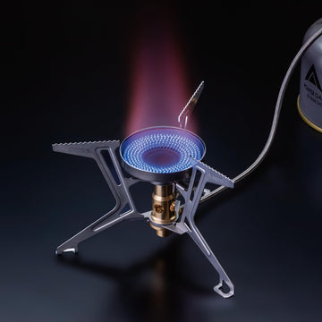 SOTO Fusion Trek micro regulator close-up highlights steady flame for varied conditions.