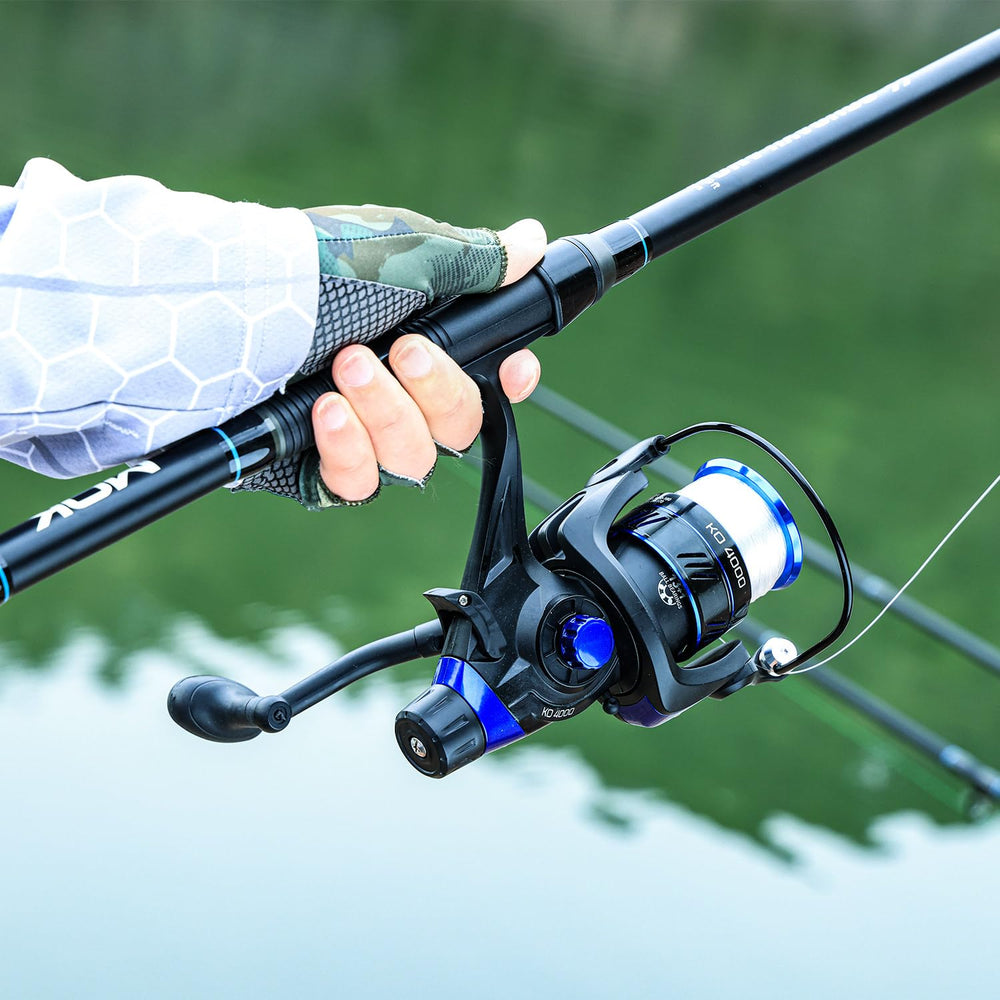 Angler holding Sougayilang combo by the water