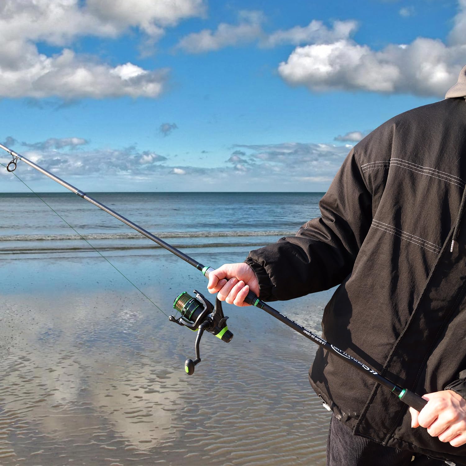 Angler using the 10ft travel surf rod on rocky shore