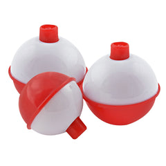 SOUTH BEND red and white push-button float increases bite visibility for freshwater fishing from a distance.