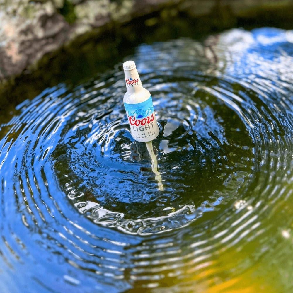 Close-up of weighted slip bobber design for precise depth control.