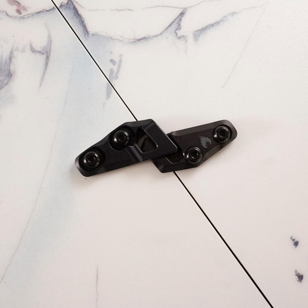 Closeup of aluminum Fixie top-mount clip highlighting durable, single-piece construction.